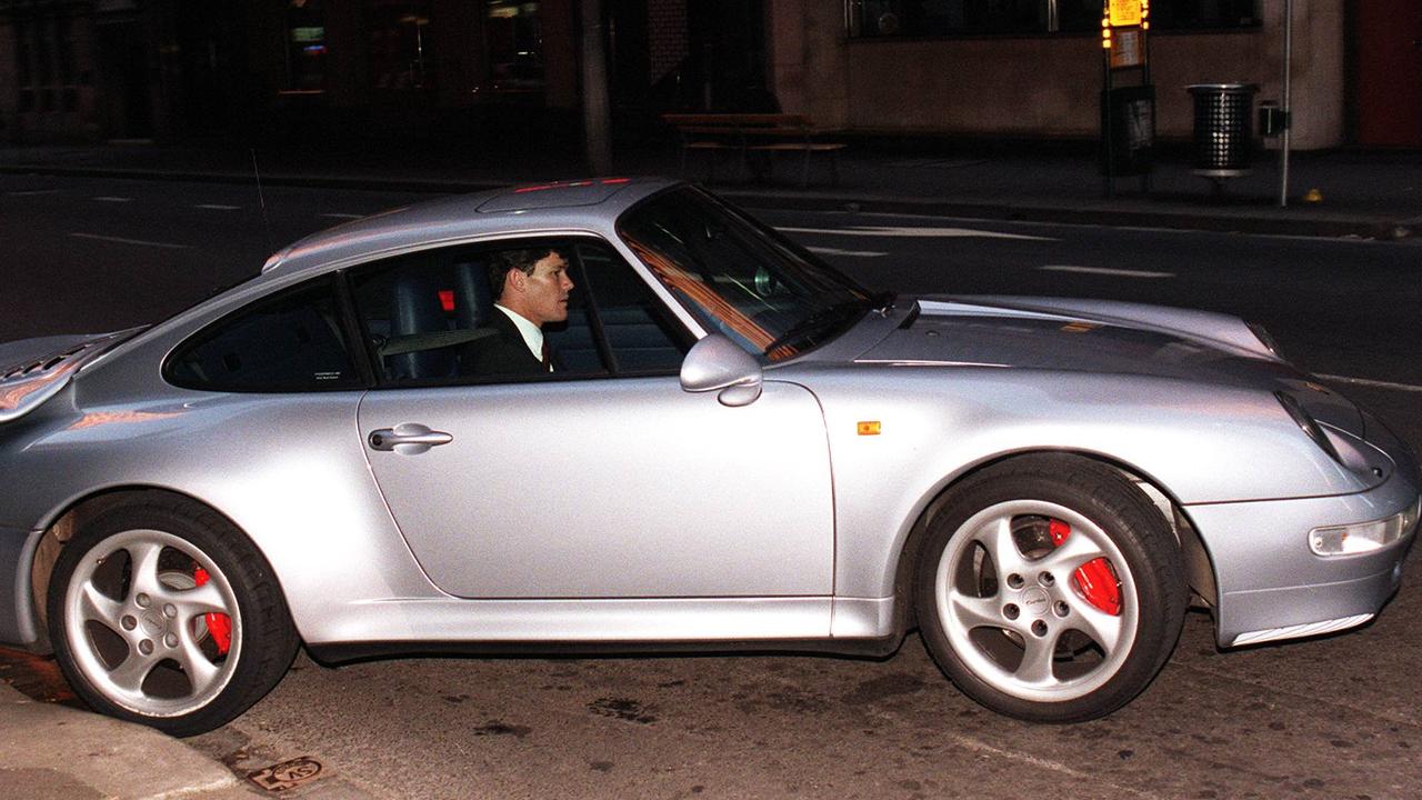 James Packer behind the driver’s wheel of a Porsche 911 in 1996.