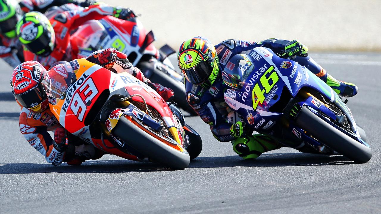 Marc Marquez and Valentino Rossi in action during Australian GP. Picture: Mark Stewart