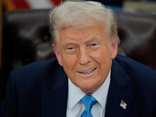 WASHINGTON, DC - JANUARY 31: U.S. President Donald Trump talks to reporters after signing an executive order, "Unleashing prosperity through deregulation," in the Oval Office on January 31, 2025 in Washington, DC. Trump spoke to reporters about tariffs against China, Canada and Mexico and how the newly confirmed Interior Secretary Doug Burghum will coordinate with the Energy Department and the Environmental Protection Agency.   Chip Somodevilla/Getty Images/AFP (Photo by CHIP SOMODEVILLA / GETTY IMAGES NORTH AMERICA / Getty Images via AFP)