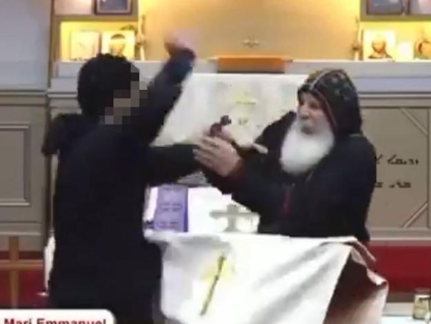 Blurred footage of the teenager who allegedly stabbed the Bishop Mar Mari Emmanuel during a service at The Good Shepard Church in Sydney. Picture: Twitter