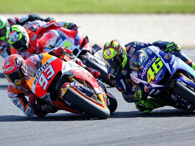 2015 Australian Motorcycle Grand Prix at Phillip Island - Marc Marquez and Valentino Rossi in action during the race. Picture: Mark Stewart