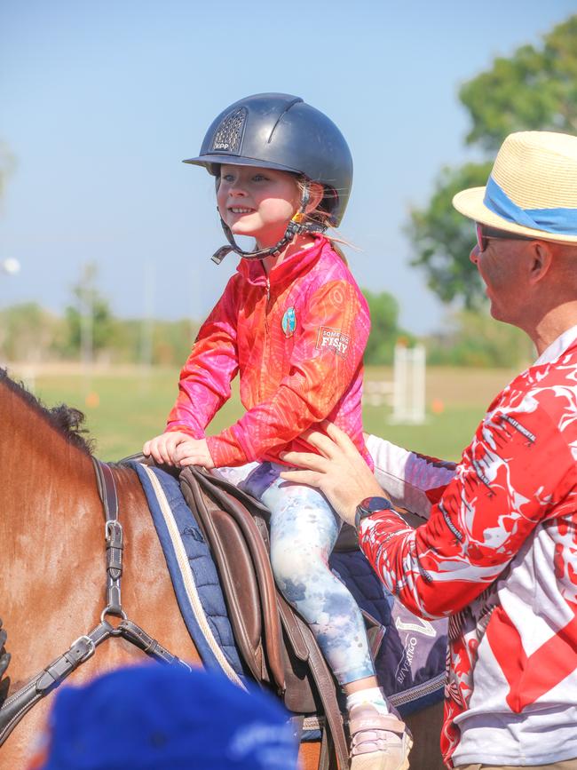 Evelyn Gies, 4, enjoying day two of the Royal Darwin Show. Picture: Glenn Campbell