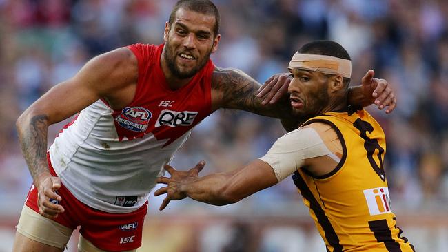 Lance Franklin and Josh Gibson tangle in the 2014 Grand Final. Picture: Brett Costello