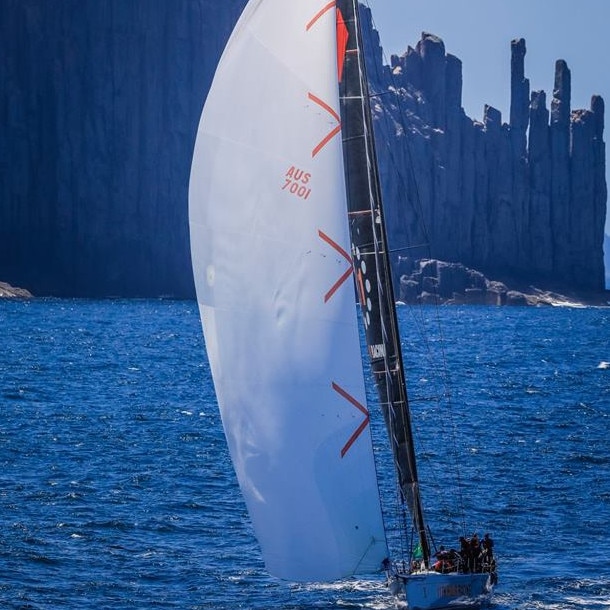 Sydney to Hobart yacht Wild Oats sailing past Tasman Island during last year’s race.