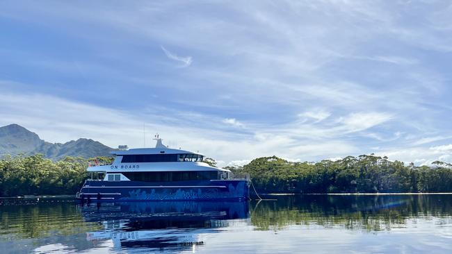 The luxury cruise vessel Odalisque III, reflected in the stillness at Bathurst Harbour, can accommodate 12 guests. Port Davey cruise, Tasmania. Picture: Philip Young