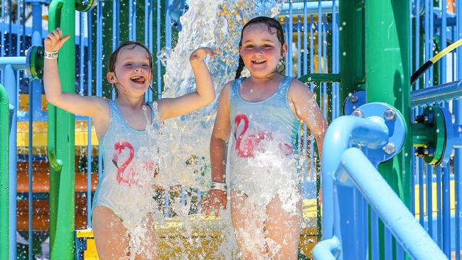 These girls enjoy the water play at the park. Picture: Tim Carrafa