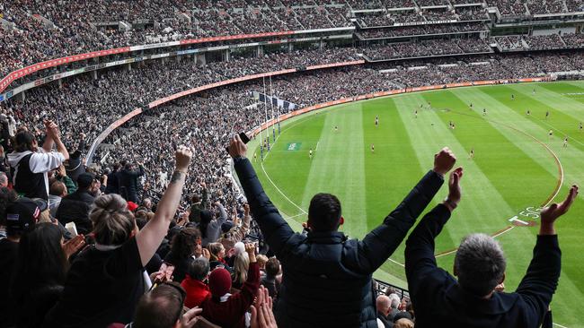 The huge crowd for the AFL match between Collingwood and Essendon at the MCG. Picture Ian Currie