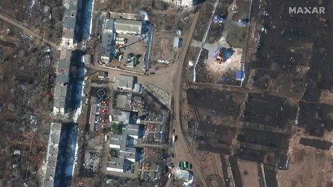 A damaged church and residential apartment buildings in Sumy, Ukraine. Picture: Maxar Technologies/AFP