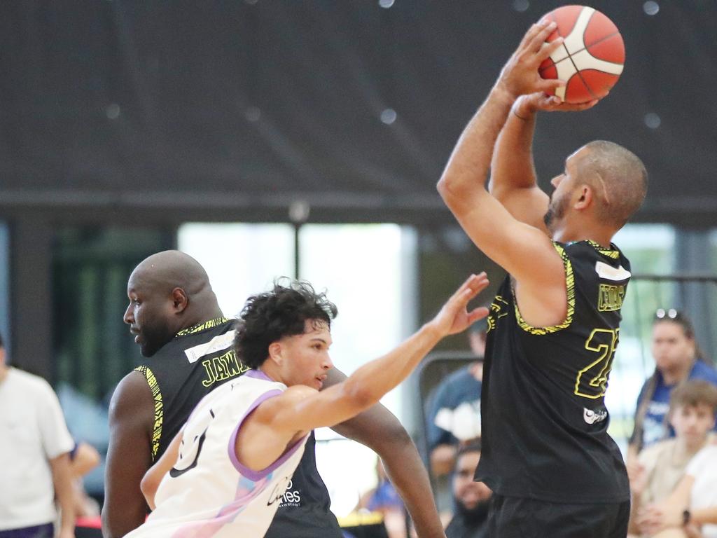 Basketball Queensland First Nations Championships at Coomera. Dreamers (white) v Erub Utd. Picture Glenn Hampson