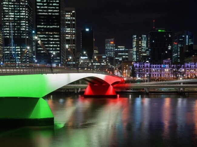 Brisbane's Victoria Bridge and Reddacliff Place will be lit in the colours of the Iranian flag this Saturday in a show of support for Iran's people. Photo: Adrian Schrinner.