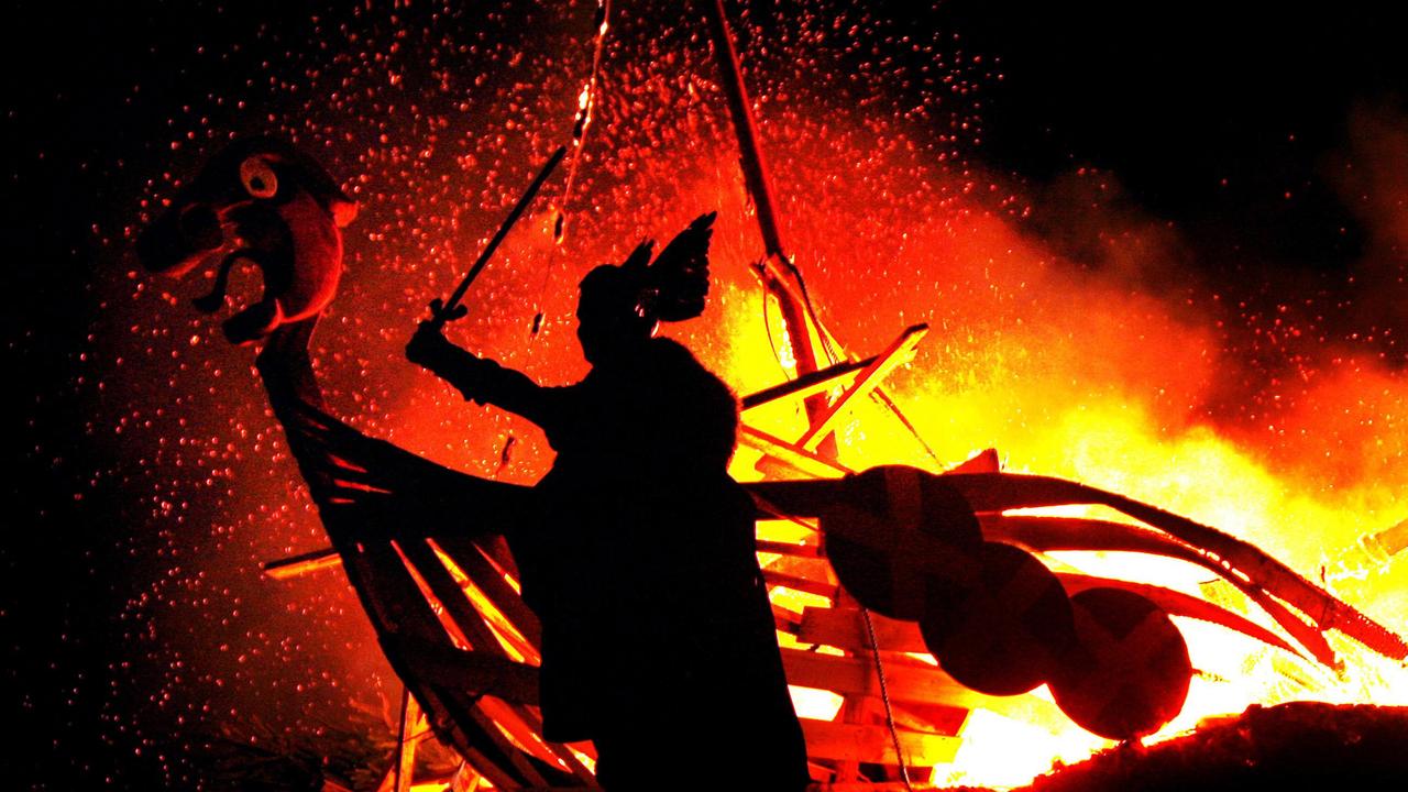 A reveller dressed as Viking take part in a 'Torchlight Procession' as part of Edinburgh's Hogmanay celebrations. There was more to the Vikings than just marauding raiders. Picture: AP