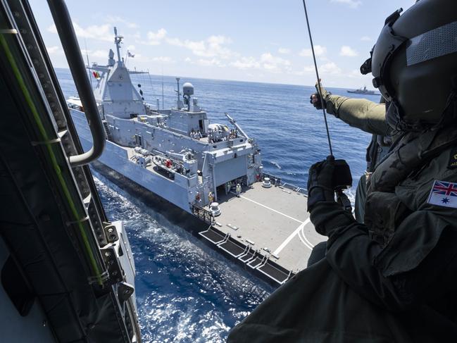 Petty Officer Aircrewman Raymond Solomon gives a thumbs up to the crew of Royal Malaysian Navy Ship KD Selangor during a cooperative activity with HMAS Parramatta. Four Royal Australian Navy vessels, HMA Ships Anzac, Ballarat, Sirius and Parramatta are currently deployed on a regional presence deployment.   Operating in two separate Task Groups, the four ships are conducting a number of activities with partners across Northeast and Southeast Asia and the Northeast Indian Ocean.   These deployments are part of the Australian Defence Force’s robust and long-standing program of international engagement in the region, demonstrating Australia’s commitment to working with partners to address shared challenges, including our region’s maritime security. Picture: LSIS Jarrod Mulvihill/Defence Department