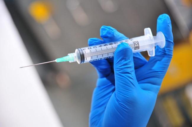 Needle and syringe held by gloved at Nambour General Hospital. Photo: Iain Curry / Sunshine Coast Daily. Picture: Iain Curry