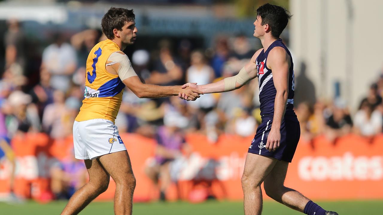 Andrew Brayshaw and Andrew Gaff shake hands before their JLT clash. Picture: Getty Images 