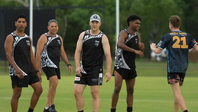 Gary Ablett Jr with a couple of Palmerston players ahead of the big game. Picture: (A)manda Parkinson