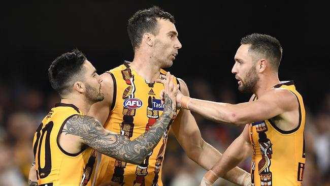 Chad Wingard (left) will miss again with injury for Hawthorn. Picture: Albert Perez/Getty Images.