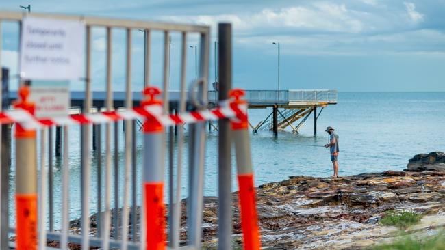 A fence has been put up to stop people walking along the Nightcliff Jetty. Photograph: Che Chorley