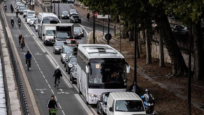 Millions will be spent on cycleways, particularly in and around urban hubs (Photo by Martin BUREAU / AFP)