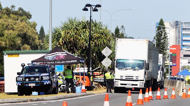 Police checking trucks at the Queensland border at Coolangatta last month. Picture: Nigel Hallett