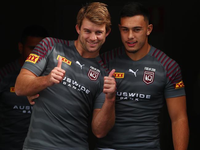 GOLD COAST, AUSTRALIA - JUNE 03: Christian Welch and Tino Fa'asuamaleaui walk out for the start of a Queensland Maroons State of Origin training session at Cbus Super Stadium on June 03, 2021 in Gold Coast, Australia. (Photo by Chris Hyde/Getty Images)