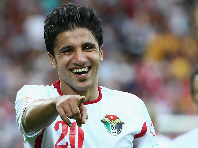 MELBOURNE, AUSTRALIA - JANUARY 16: Hamza Al Dardour of Jordan celebrates after he scored his fourth goal of the match during the 2015 Asian Cup match between Palestine and Jordan at AAMI Park on January 16, 2015 in Melbourne, Australia. (Photo by Robert Cianflone/Getty Images)