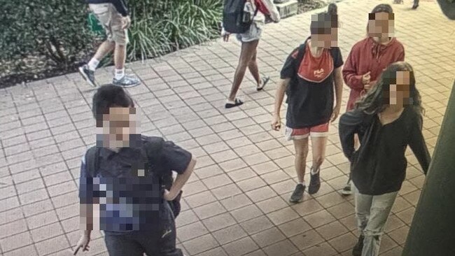 Police have released CCTV images of four teenage girls who allegedly bashed a 23-year-old commuter at Runcorn Railway Station last Thursday at about 4.30pm. Picture: Supplied