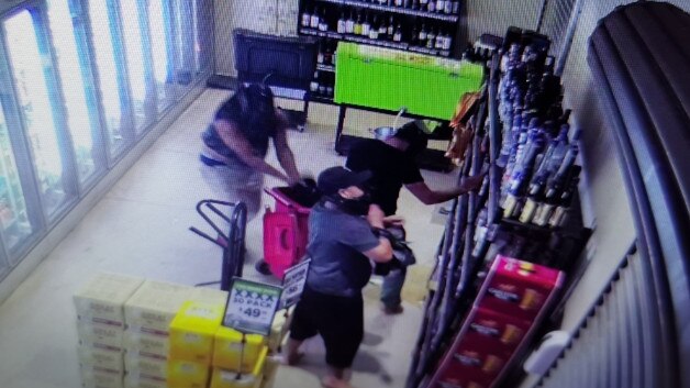 CCTV footage captured thieves filling a wheelie bin full of booze during a recent break in at the Berry Springs Tavern.