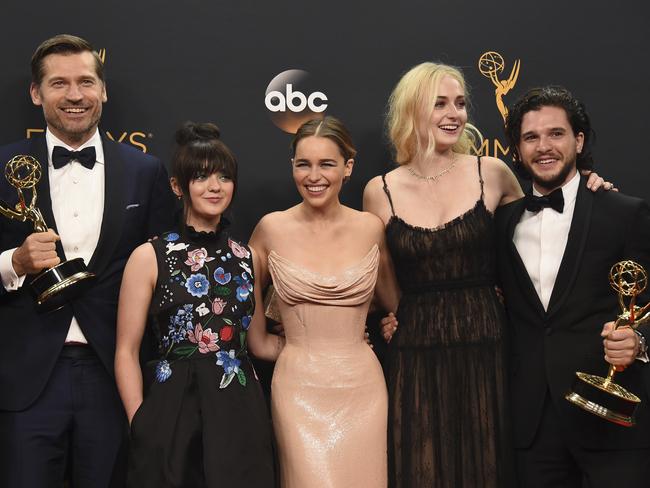 Nikolaj Coster-Waldau, from left, Maisie Williams, Emilia Clarke, Sophie Turner, and Kit Harington winners of the award for outstanding drama series for “Game of Thrones” pose in the press room at the 68th Primetime Emmy Awards on Sunday, Sept. 18, 2016, at the Microsoft Theater in Los Angeles. (Photo by Jordan Strauss/Invision/AP)