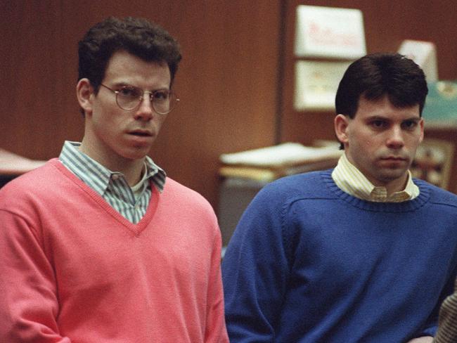 (FILES) Erik Menendez (L) and his brother Lyle (R) listen during a pre-trial hearing, on December 29, 1992 in Los Angeles after the two pleaded innocent in the August 1989 shotgun deaths of their wealthy parents, Jose and Mary Louise Menendez of Beverly Hills, California. Lyle and Erik Menendez, the two brothers whose grisly murder of their parents in their swanky Beverly Hills home gripped the United States and was the subject of a recent Netflix series, could be released from prison after Los Angeles' chief prosecutor said October 24 he would ask a judge to look again at their sentences. (Photo by VINCE BUCCI / GETTY IMAGES NORTH AMERICA / AFP)