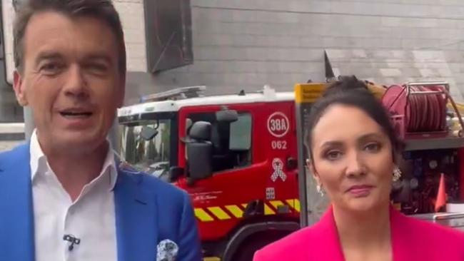 ABC Breakfast News hosts Michael Rowland and Bridget Brennan explain they evacuated after a fire alarm was set off. Picture: Twitter