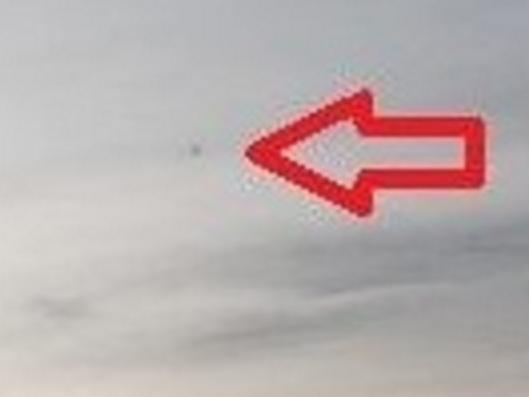 SPOTTED: Hobby photographer Charlotte Hellings from Trinity Park believes she spotted a UFO over the Redlynch-Freshwater area on September 21, 2014.