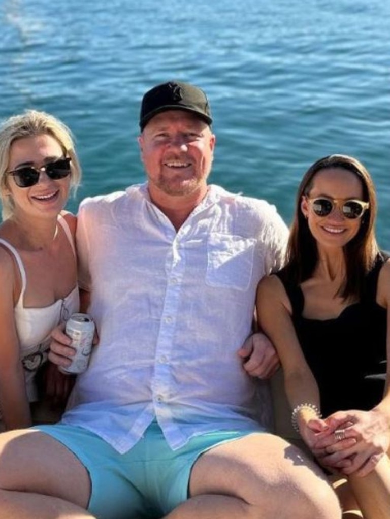 Reality TV star Dean Wells, centre, has taken aim at Jetstar over the airline’s Acknowledgement of Country message on board a domestic flight.