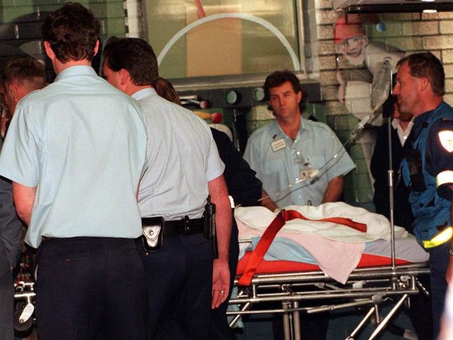 Martin Bryant arriving at the Royal Hobart Hospital by ambulance.