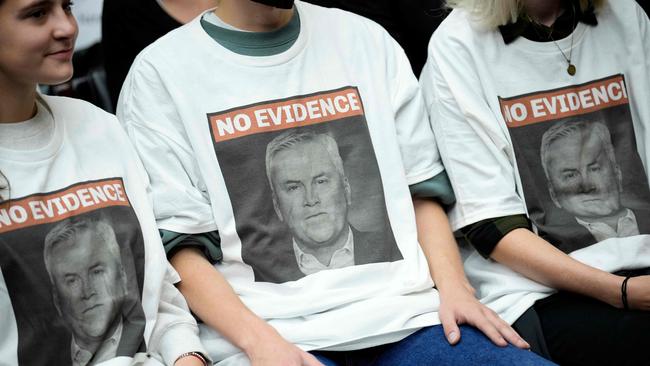 Demonstrators wear shirts with the picture of Chairman of the House Oversight Committee James Comer on them. Picture: Getty Images