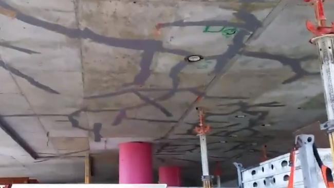 The alarming footage shows extensive cracking across the concrete slab patched with filler.