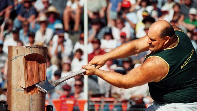 David Foster, as a member of the Australian Woodchopping team, in action at Woodchop Arena during the 1997 Sydney Royal Easter Show