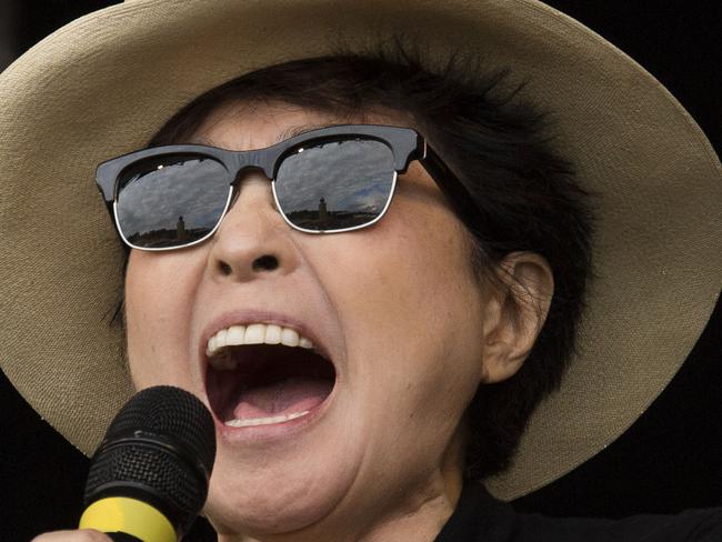 Yoko Ono and the Plastic Ono band perform on the main Pyramid stage at Glastonbury music festival, England, Sunday, June 29, 2014. Thousands of music fans have arrived for the festival to see headliners Arcade Fire, Metallica and Kasabian. (Photo by Joel Ryan/Invision/AP)