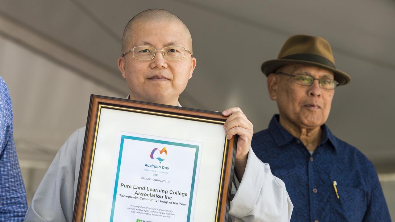 Venerable Wuquan Shi (left) and Muhammed Hanif accept award for Toowoomba Community Group of the Year for Pure Land Learning College Toowoomba Australia Day awards and celebrations at Picnic Point, Tuesday, January 26, 2021. Picture: Kevin Farmer