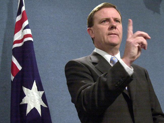 13/06/2008 LIBDISCARDS: 03/12/2003 PIRATE: Aust politician Peter Costello during press conference in Canberra 03 Dec 2003. flag