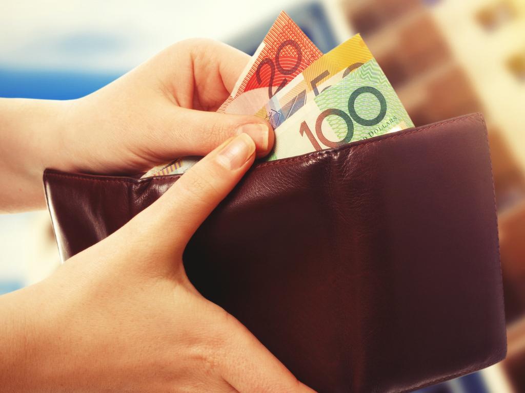 AUSTRALIAN CURRENCY/ DOLLARS/  PICTURE: istock australian money in wallet on real estate background