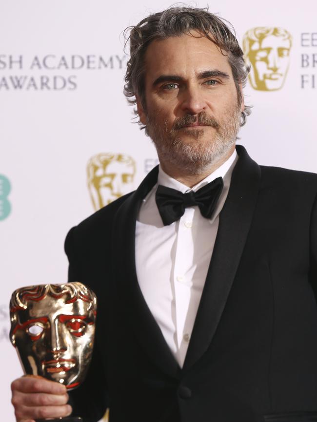 Backstage Phoenix holds his award for Best Actor for the film Joker. Picture: Invision/AP