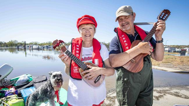 Keryn and Roger Baker with their dog Holle on their runabout Kermit at the Mannum Waters Marina. Picture Emma Brasier.