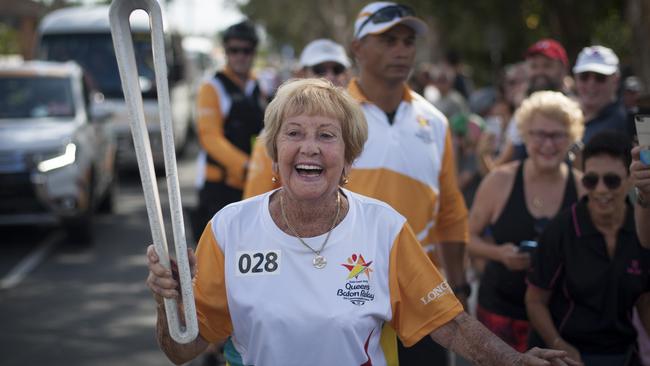 Daphne Pirie carrying the Baton as the Queen's Baton Relay.