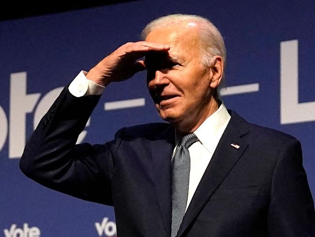 (FILES) US President Joe Biden gestures near the podium during the Vote To Live Properity Summit at the College of Southern Nevada in Las Vegas, Nevada, on July 16, 2024. US President Joe Biden doubled down on his insistence that he will stay in the White House race, despite a growing Democrat revolt that raised speculation he could bow out as soon as this weekend. âThe stakes are high, and the choice is clear. Together, we will win," the 81-year-old said in a written statement on July 19, 2024 from the Delaware beach home where he is recovering from Covid. (Photo by Kent Nishimura / AFP)