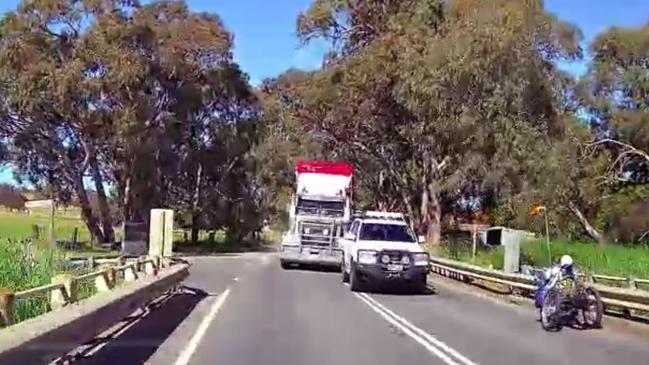 Footage has emerged of a terrifying close call between a truck carrying live sheep and a car on Main South Road. Picture: Supplied