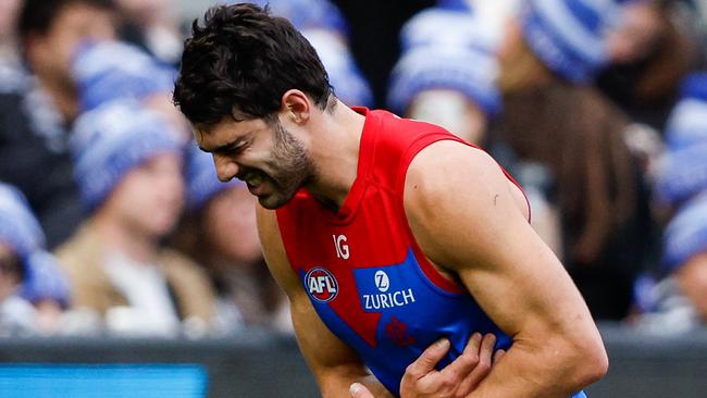 MELBOURNE, AUSTRALIA - JUNE 10: Christian Petracca of the Demons leaves the field injured during the 2024 AFL Round 13 match between the Collingwood Magpies and the Melbourne Demons at The Melbourne Cricket Ground on June 10, 2024 in Melbourne, Australia. (Photo by Dylan Burns/AFL Photos via Getty Images)