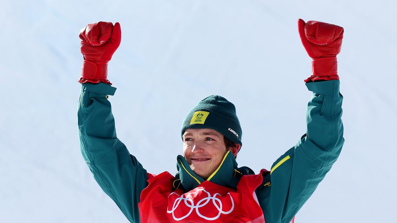 ZHANGJIAKOU, CHINA - FEBRUARY 11: Silver medallist Scotty James of Team Australia celebrates during the Men's Snowboard Halfpipe flower ceremony on day 7 of the Beijing 2022 Winter Olympics at Genting Snow Park on February 11, 2022 in Zhangjiakou, China. (Photo by Al Bello/Getty Images)