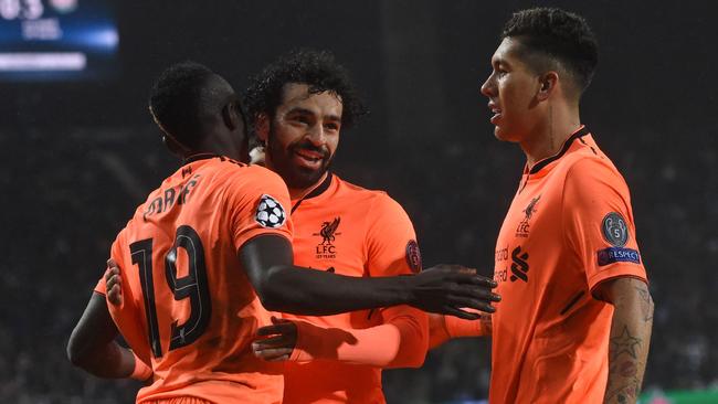 Liverpool’s fab three celebrate a goal against Porto