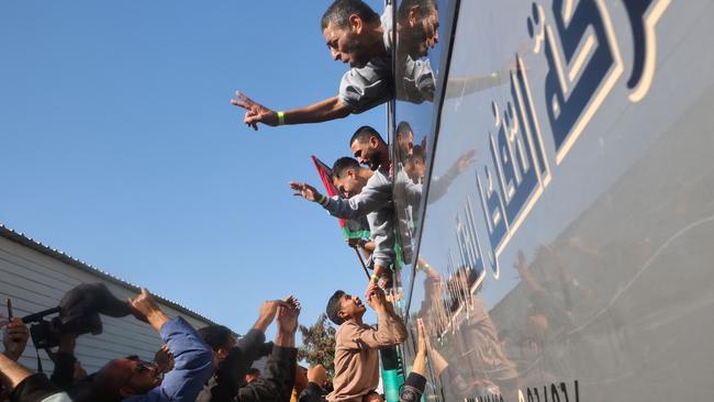 Palestinians who were imprisoned by Israel are welcomed by family and friends as they arrive at the European Hospital in Khan Younis following their release in a hostage-prisoner exchange as part of a ceasefire deal for Gaza agreed by Israel and Hamas. Picture: AFP