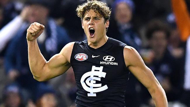 MELBOURNE, AUSTRALIA - JUNE 15: Charlie Curnow of the Blues celebrates kicking a goal during the round 13 AFL match between the Carlton Blues and the Western Bulldogs at Marvel Stadium on June 15, 2019 in Melbourne, Australia. (Photo by Quinn Rooney/Getty Images)